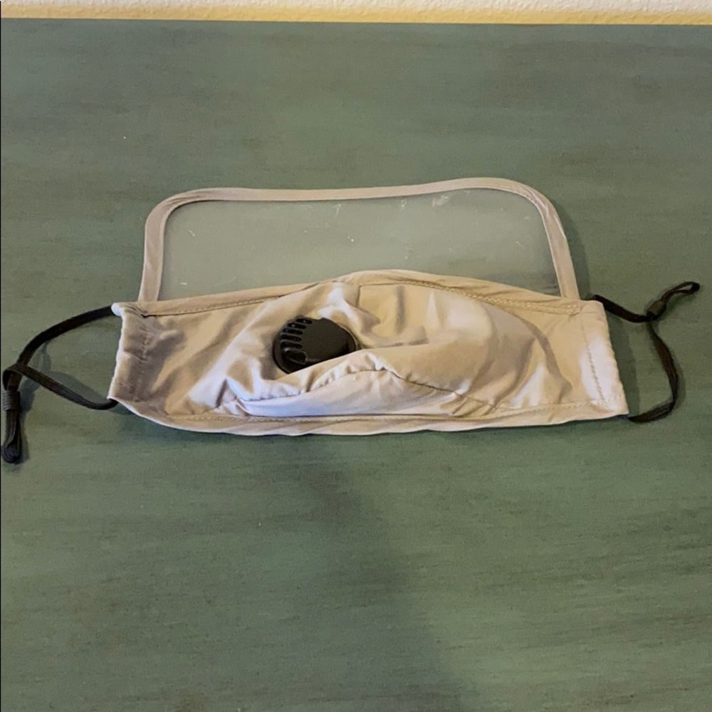 Face mask with eye shield